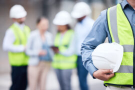 Contractors wearing hard hats.